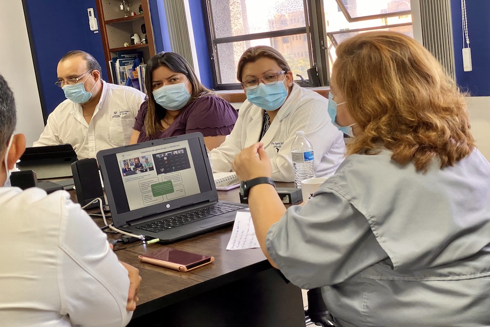 Physicians participating in an ECHO meeting